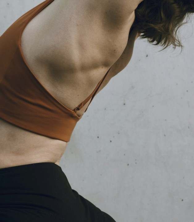 Instructor demonstrating pose